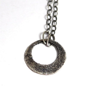 Fine and sterling silver textured circle necklace