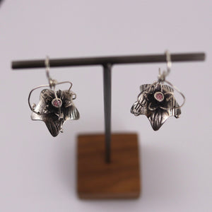 Fine silver Flower Drop earrings with pink CZ’s on a sterling silver ear wires.